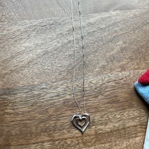Double heart necklace with small diamonds